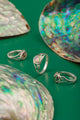 Close-up of Iris Drop Ring – delicate ocean-inspired silver jewelry for women