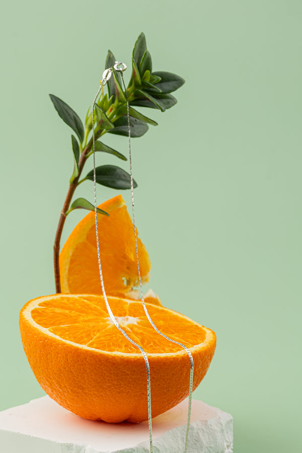 Citrus Radiance Necklace – 925 Sterling Silver handcrafted jewelry inspired by the golden glow of sunlit citrus groves, part of the Eden’s Chains Collection