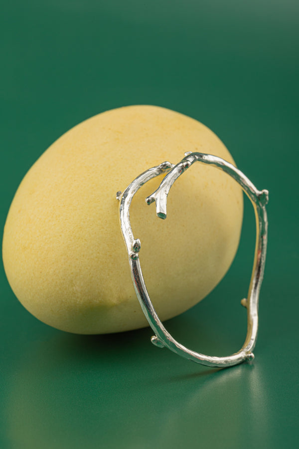 Minimalist boho-chic jewelry – The Purity Branch Cuff reflects natural fluidity, resilience, and understated elegance