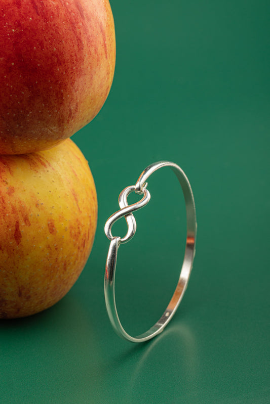 Infinity Cuff – 925 Sterling Silver handcrafted bracelet featuring a sleek infinity motif, part of the Eden’s Touch Collection