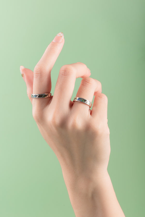 Shimmering sterling silver ring inspired by ocean light and movement