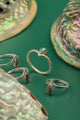 Minimalist silver ring with iridescent crushed seashell

