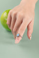 Handcrafted sterling silver ring with iridescent shell center