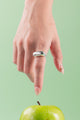 Elegant silver halo ring with polished band and subtle glow